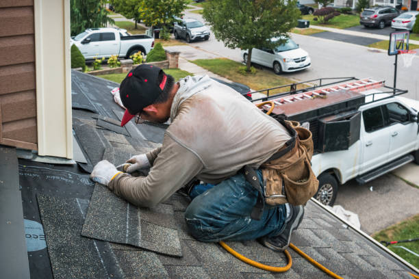 Professional Roof Replacement technician working in Plymouth, NY
